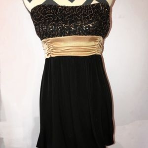 Strapless black and gold dress